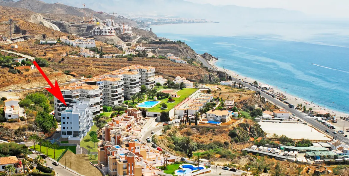 Sale of middle floor apartment in Torrox Costa 8