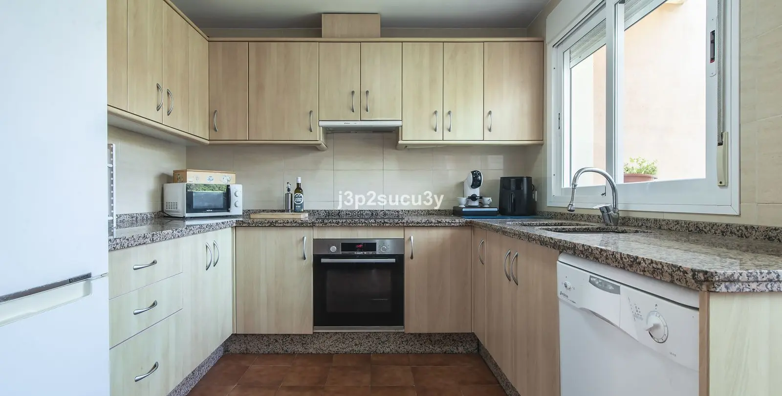 Продажа дома на две семьи в Estepona 11