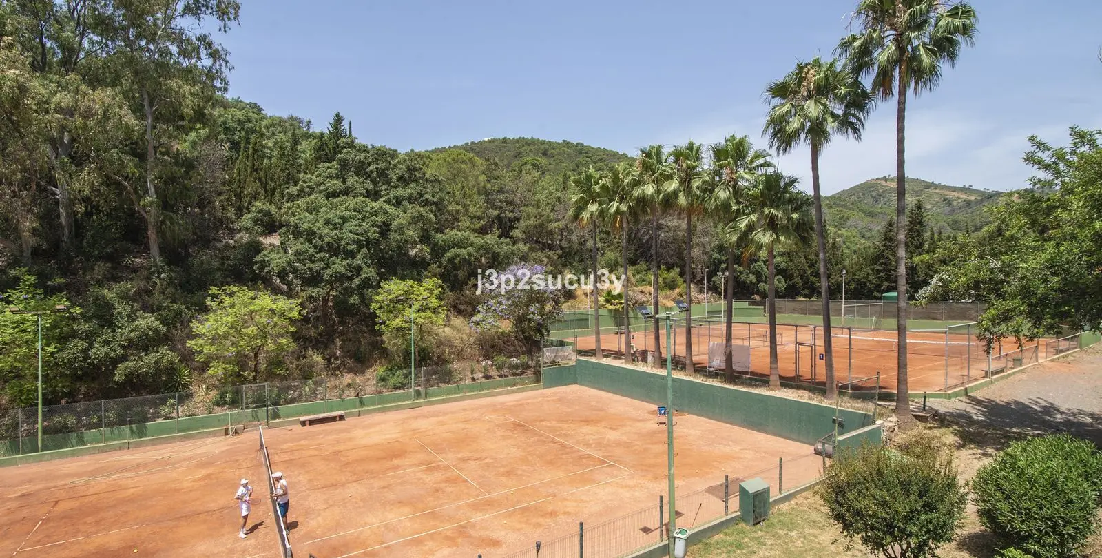 Продажа дома на две семьи в Estepona 46