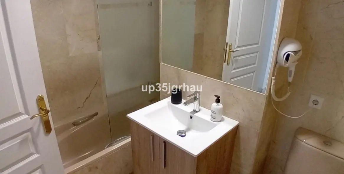 Продажа апартаментов на среднем этаже в Estepona 21