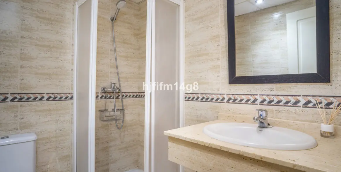 Sale of ground floor apartment in Nueva Andalucía 14