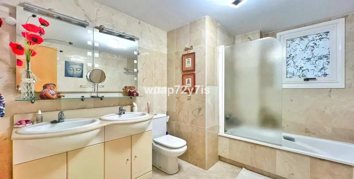 Venta de apartamento en planta baja en Guadalmina Alta 11