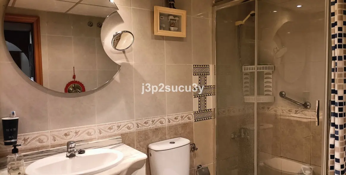 Venta de apartamento en planta baja en Guadalmina Alta 14