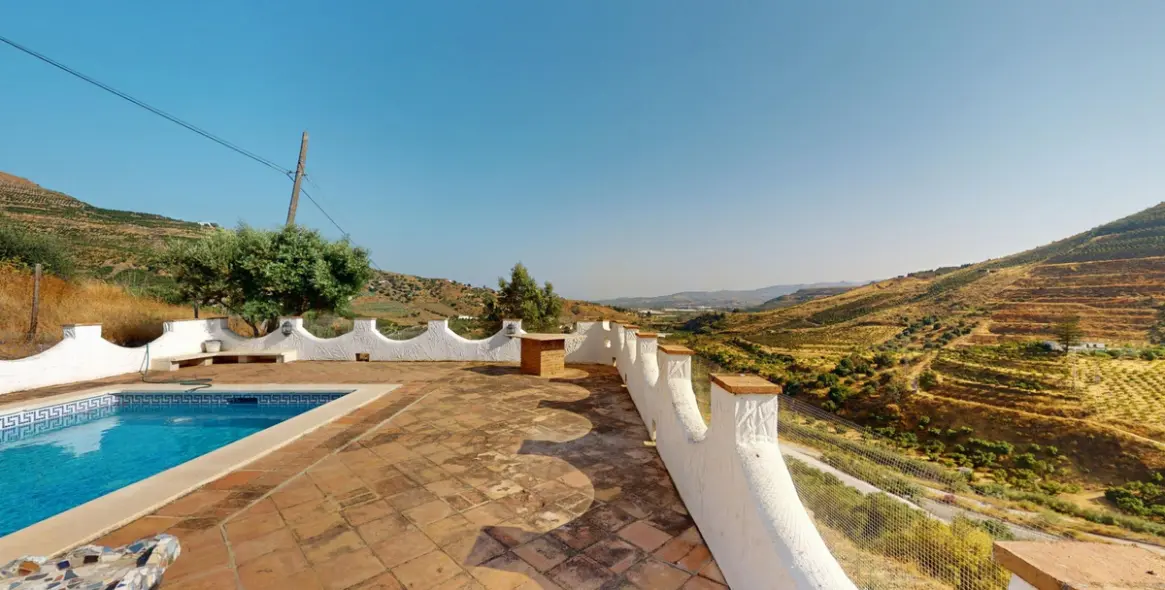 Продажа  отдельно стоящей виллы в La Viñuela 34