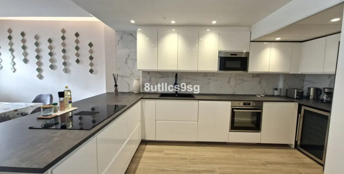 Sale of ground floor apartment in Nueva Andalucía 5