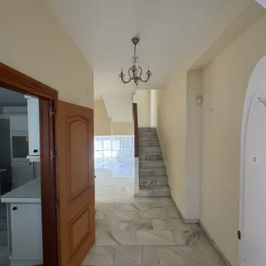 Продажа дома на две семьи в Torrequebrada