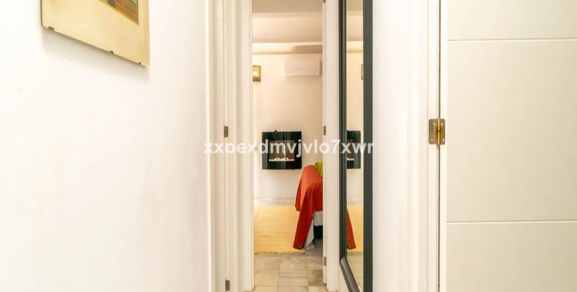 Продажа дома на две семьи в Estepona 5