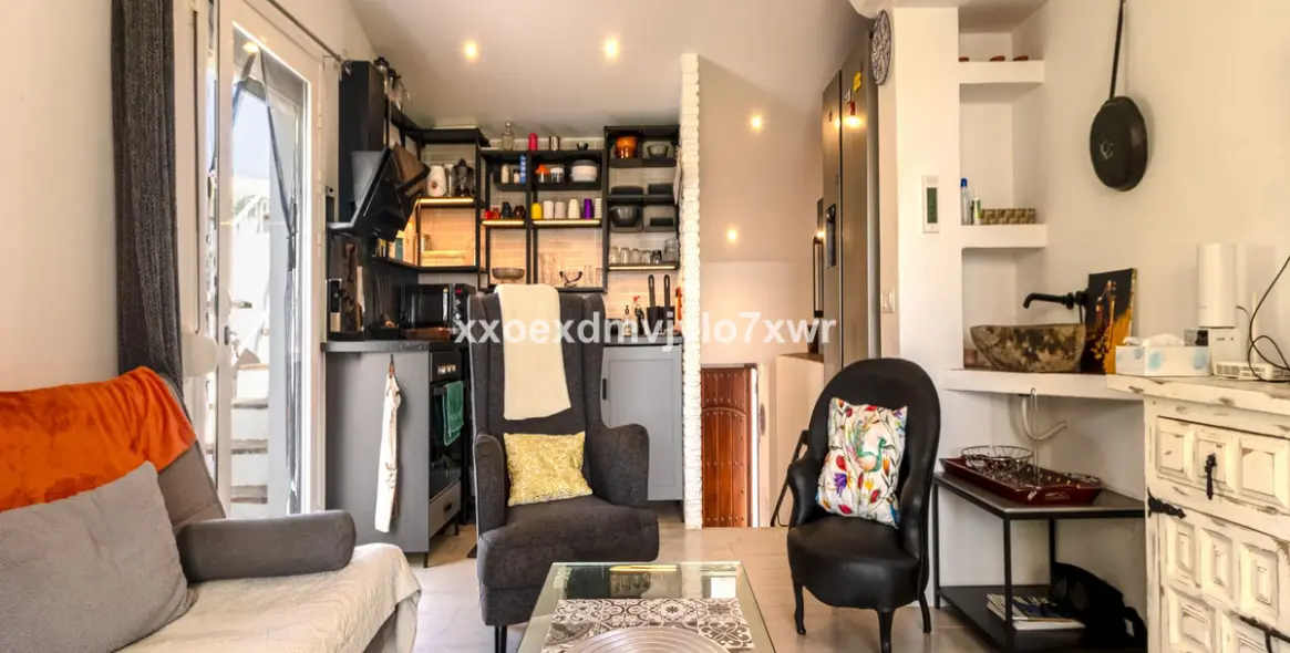 Продажа дома на две семьи в Estepona 15