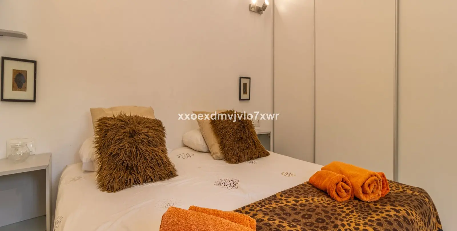 Продажа дома на две семьи в Estepona 11