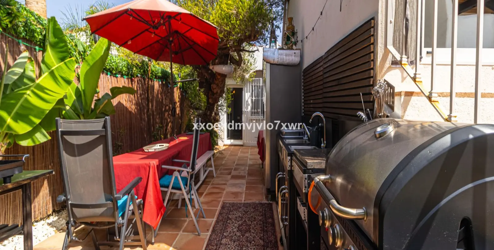 Продажа дома на две семьи в Estepona 25