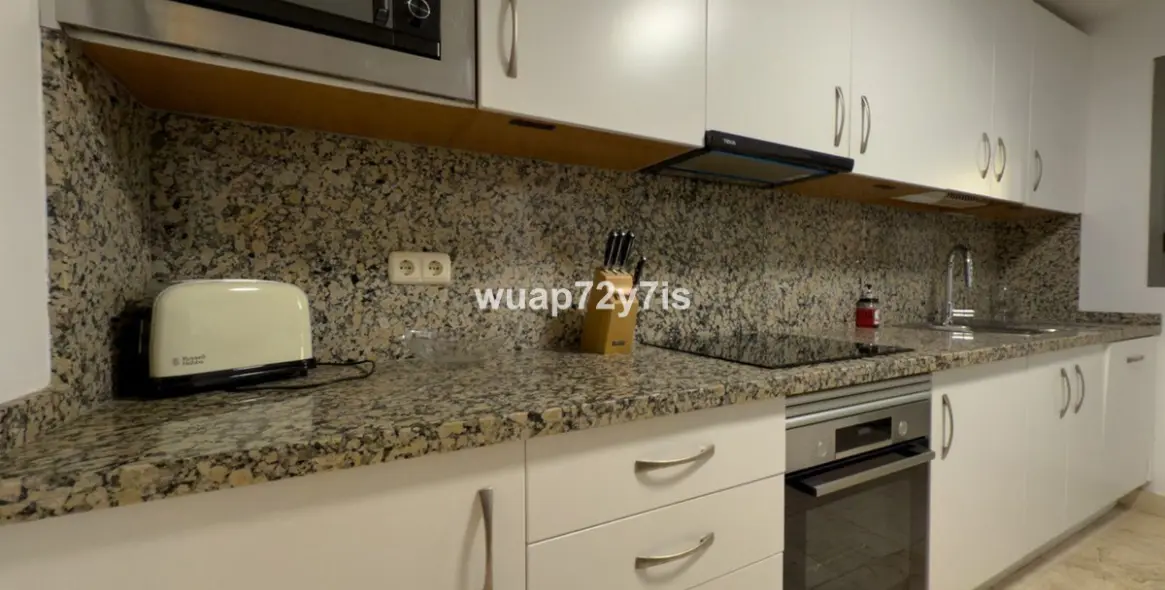 Продажа апартаментов на первом этаже в Estepona 13