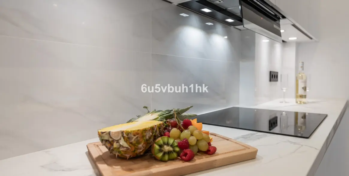 Venta de apartamento en planta media en Estepona 21