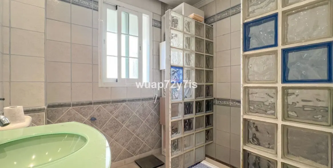 Продажа дома на две семьи в Estepona 20