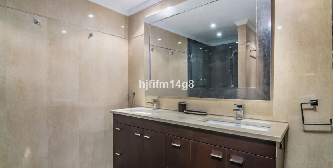 Sale of middle floor apartment in Nueva Andalucía 11