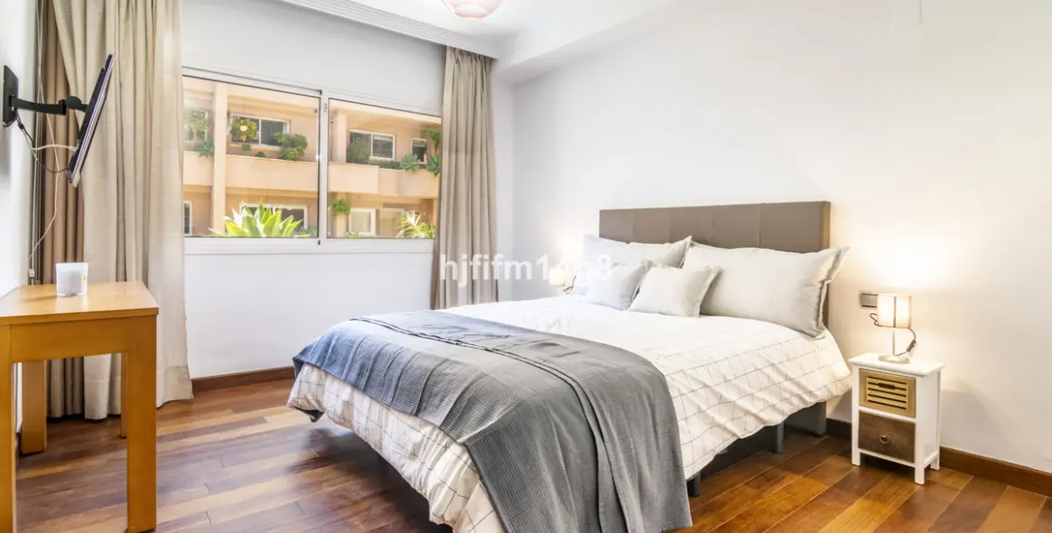 Sale of middle floor apartment in Nueva Andalucía 13