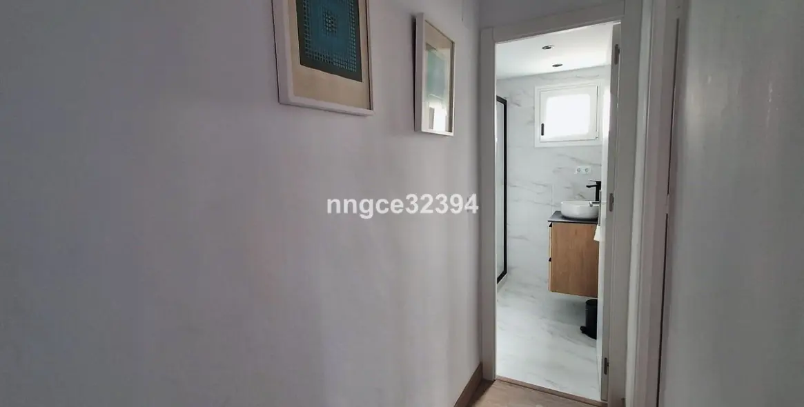 Sale of middle floor apartment in Mijas Costa 19