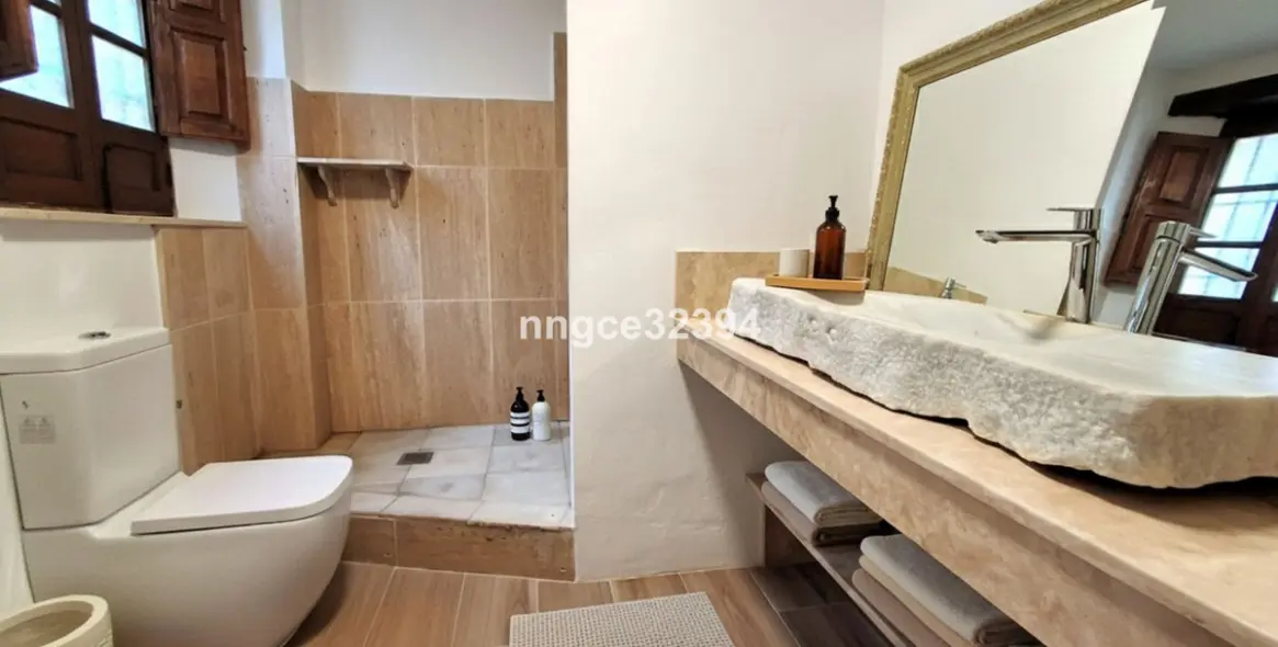 Продажа дома на две семьи в Benahavís 13