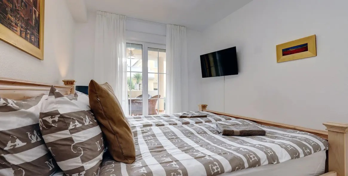 Short-term rent of ground floor apartment in Cabopino 23