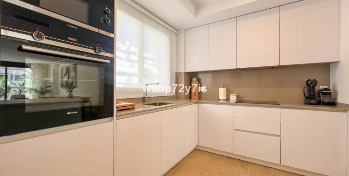 Продажа апартаментов на первом этаже в Estepona 10