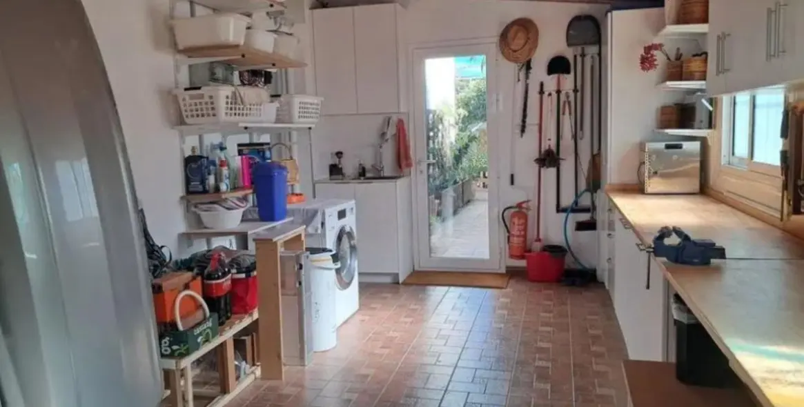 Продажа дома на две семьи в Estepona 17