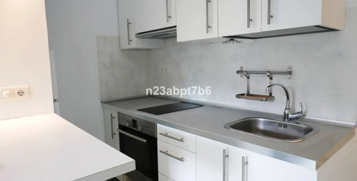 Sale of ground floor apartment in Nueva Andalucía 12