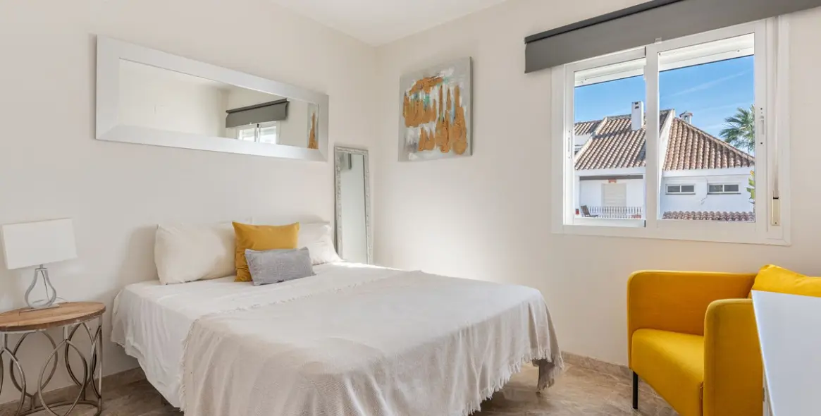 Продажа дома на две семьи в Nueva Andalucía 13