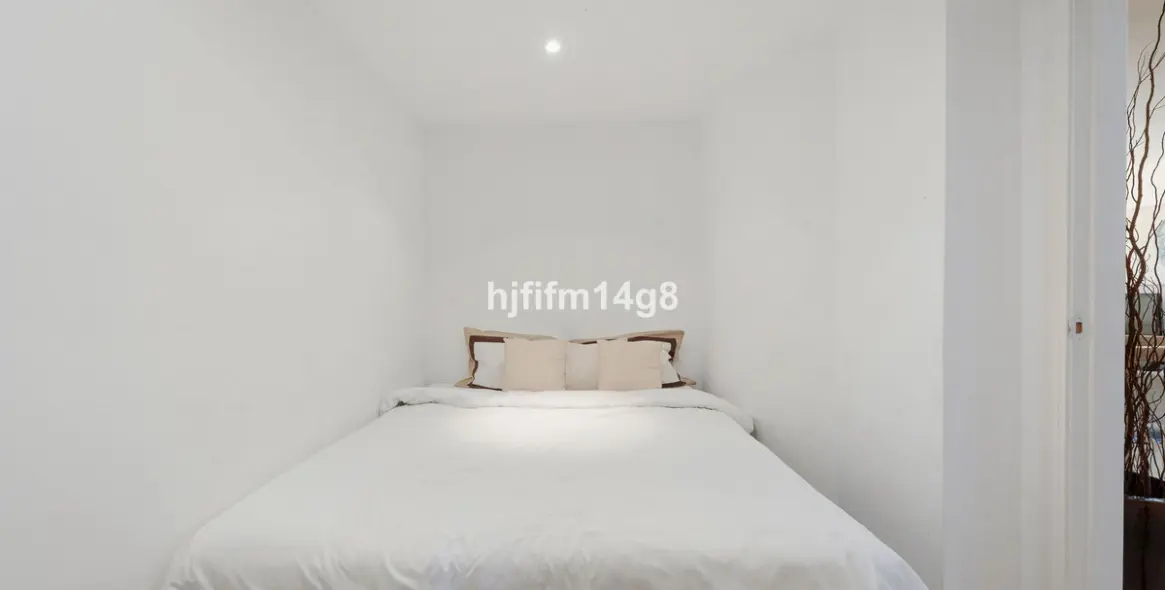 Sale of ground floor apartment in Nueva Andalucía 14