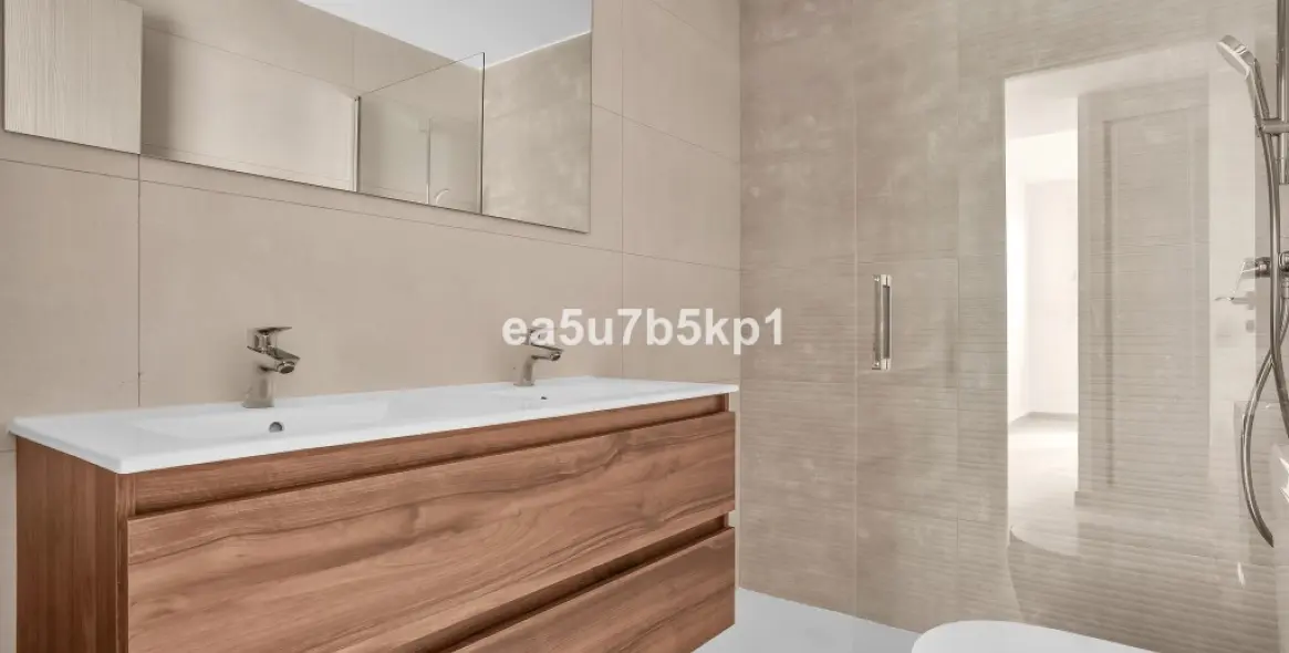 Продажа апартаментов на первом этаже в Manilva 5