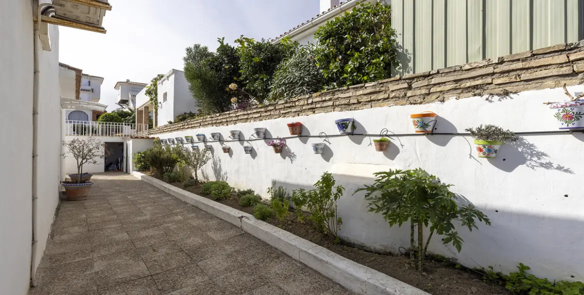 Продажа дома на две семьи в Manilva 17