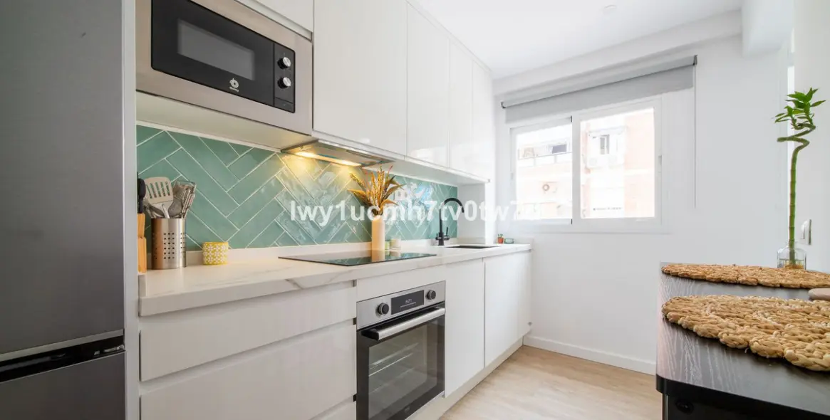 Venta de apartamento en planta media en Rincón de la Victoria 4