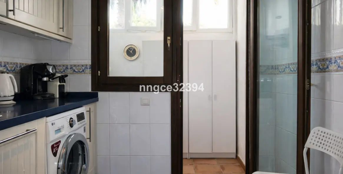 Продажа дома на две семьи в Manilva 18