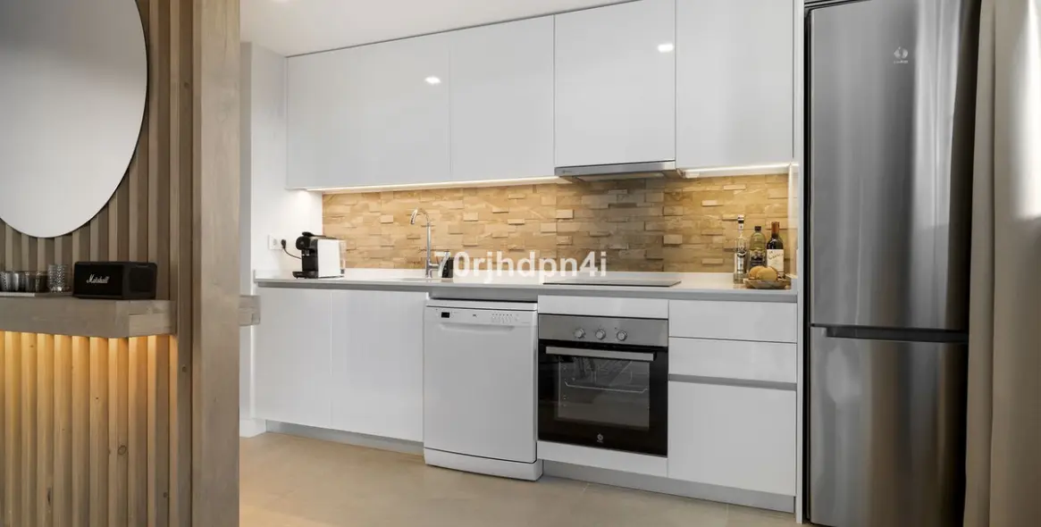 Продажа апартаментов на среднем этаже в Estepona 12