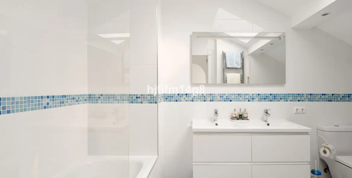 Продажа двухуровневого пентхауса в Nueva Andalucía 13