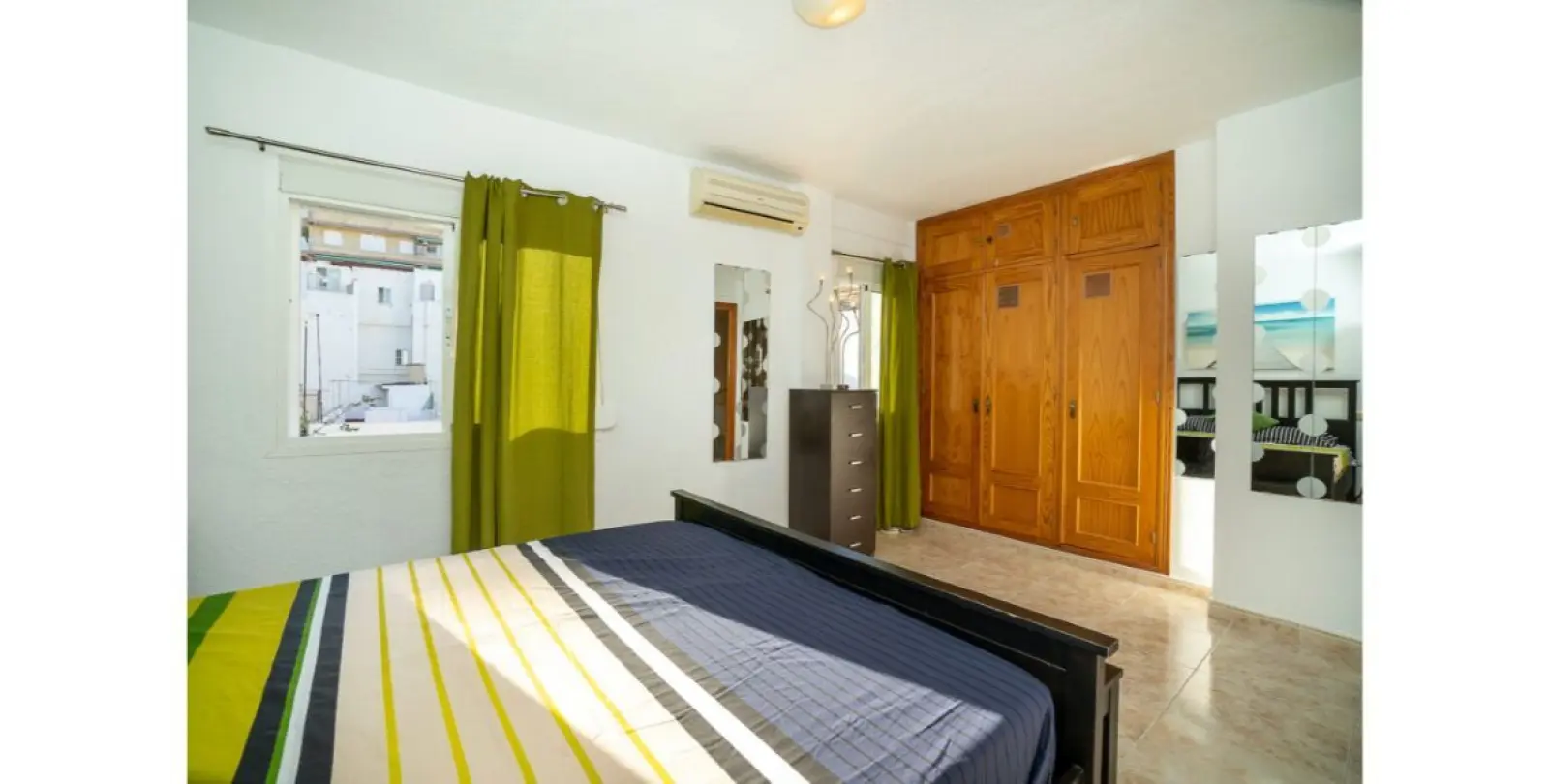 Venta de apartamento en planta media en Los Boliches 16