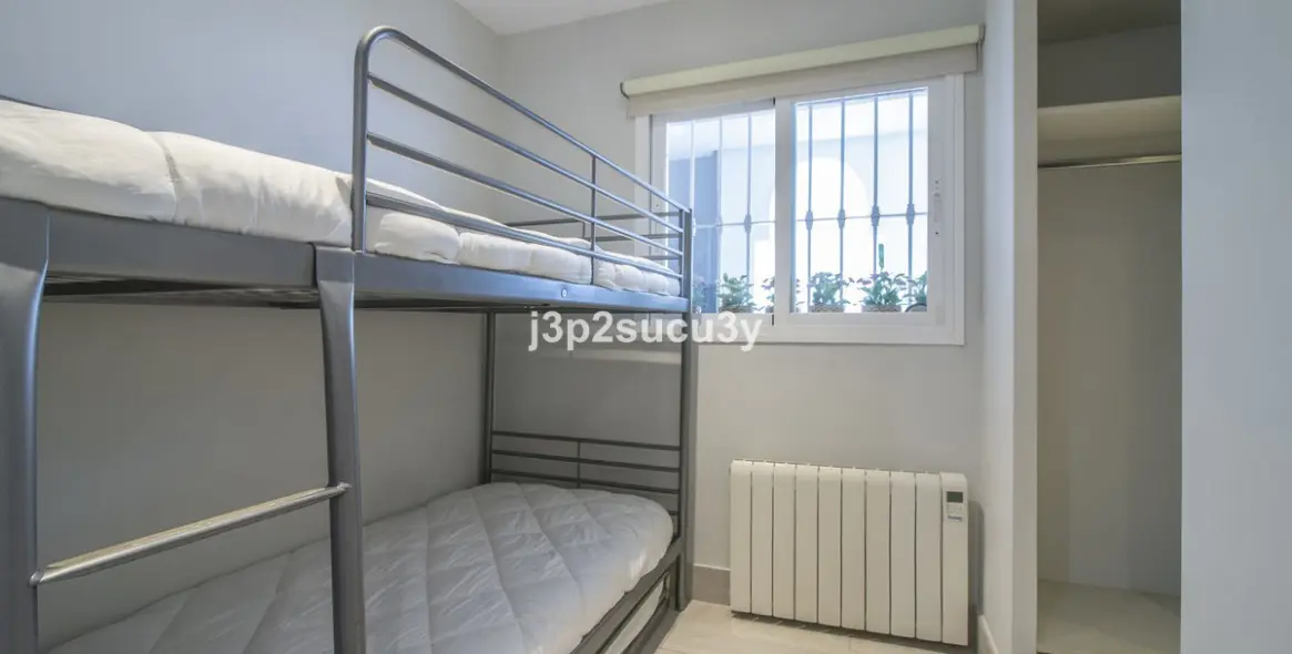 Продажа апартаментов на первом этаже в Guadalmina Baja 23