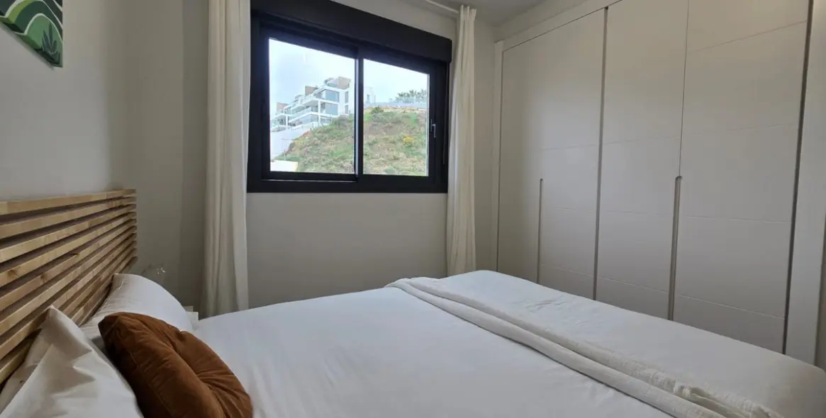 Sale of middle floor apartment in Mijas Costa 13