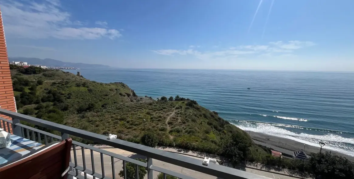 Sale of middle floor apartment in Torrox Costa 2