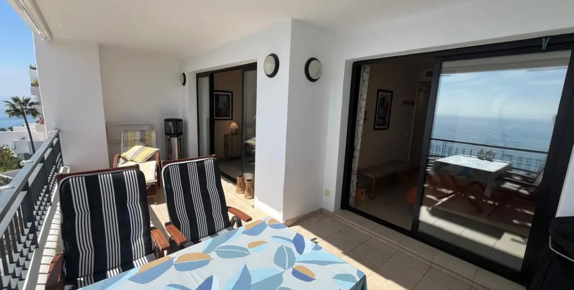 Sale of middle floor apartment in Torrox Costa 5