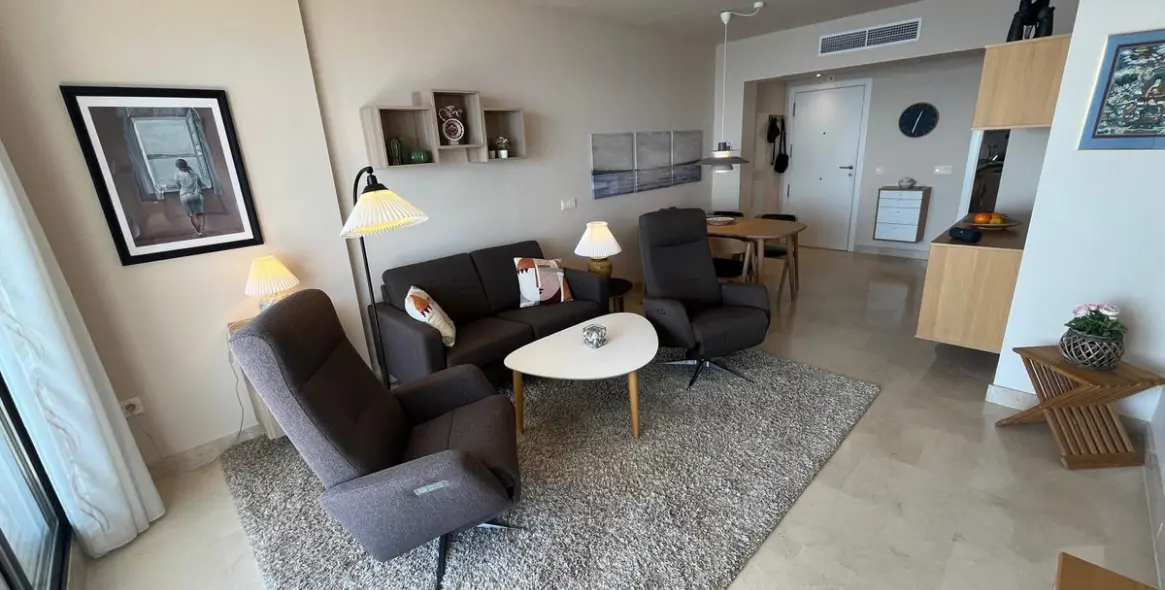 Sale of middle floor apartment in Torrox Costa 7