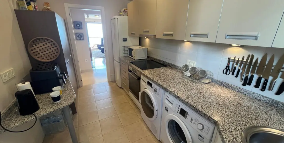 Sale of middle floor apartment in Torrox Costa 8