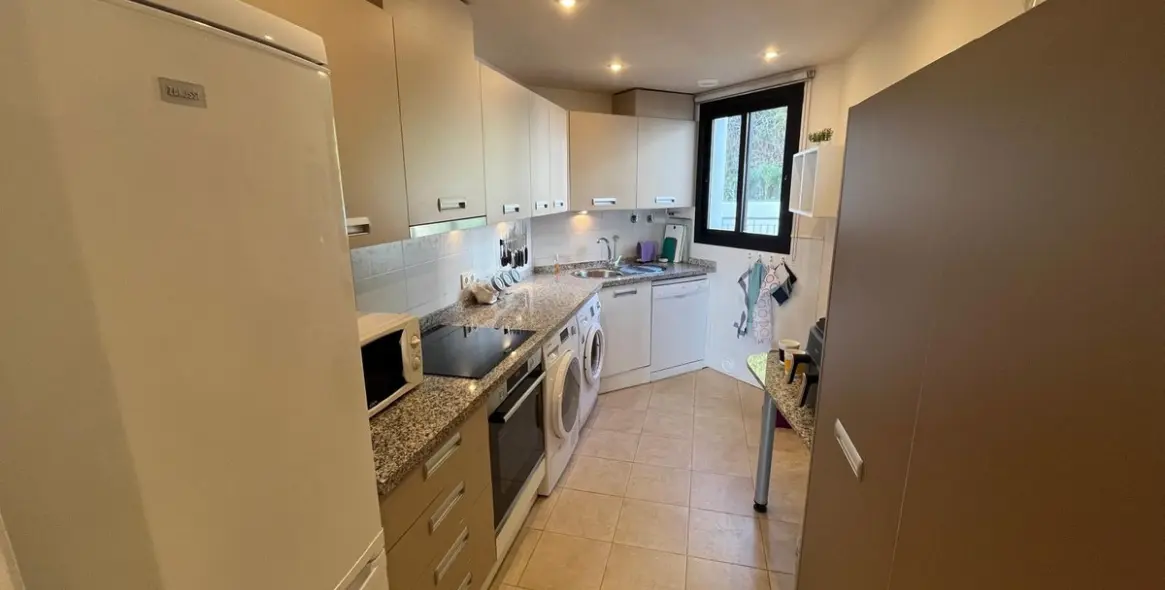 Sale of middle floor apartment in Torrox Costa 9