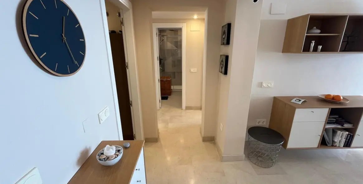 Sale of middle floor apartment in Torrox Costa 13