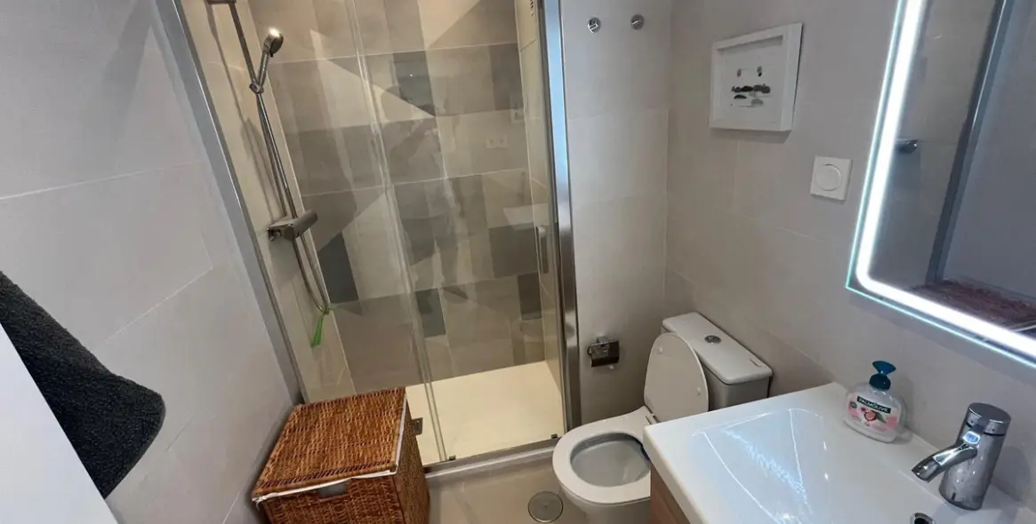 Sale of middle floor apartment in Torrox Costa 14