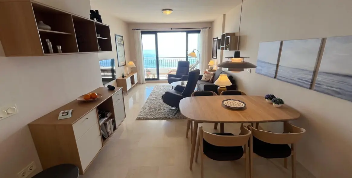 Sale of middle floor apartment in Torrox Costa 33