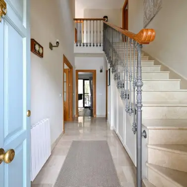 Продажа дома на две семьи в Coín