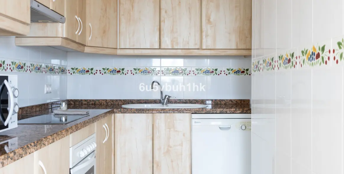 Sale of penthouse in Torrox Costa 12