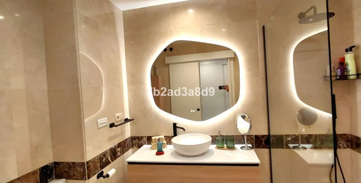 Venta de apartamento en planta media en Nagüeles 18