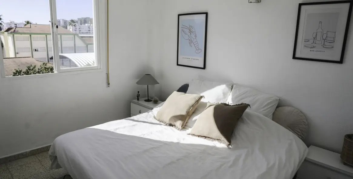 Venta de apartamento en planta media en Los Boliches 6