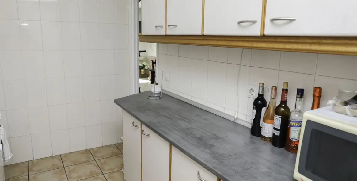 Venta de apartamento en planta media en Los Boliches 32