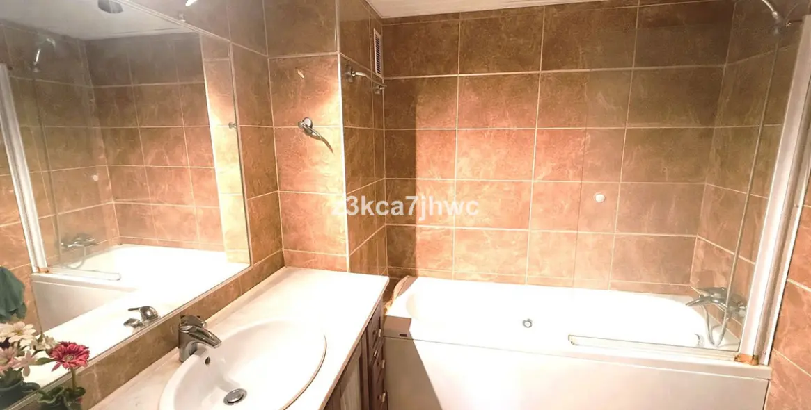 Продажа апартаментов на среднем этаже в Estepona 11